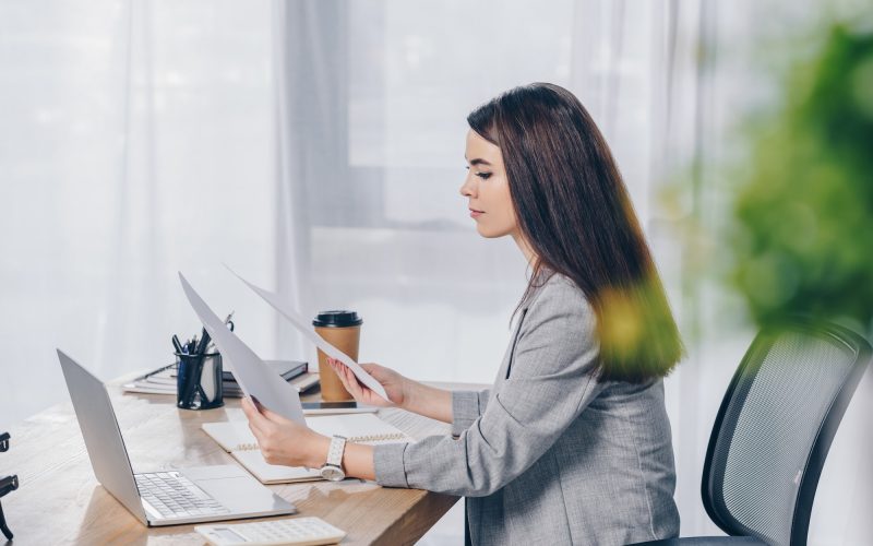 selective-focus-of-recruiter-holding-papers-at-table-in-office.jpg selective-focus-of-recruiter-holding-papers-at-table-in-office.jpg